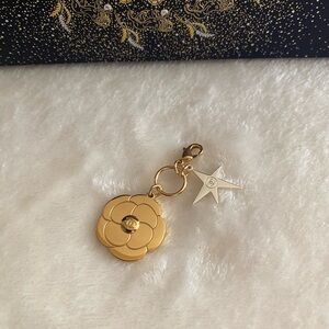 Chanel Camellia Flower and Silver Star Charm